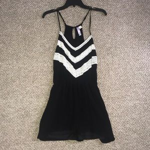 Francesca’s Black Romper With White Crochet Detail